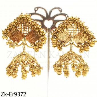 Clustered golden earrings.